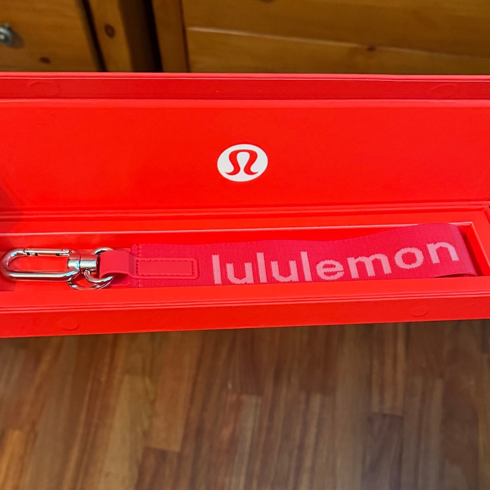 Lululemon Athletica Red Keychain Holder brand new in the box